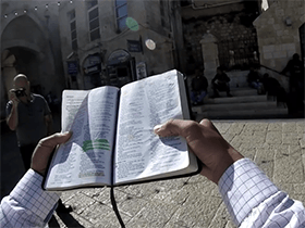 Pastor Zephaniah Mel street evangelism in Jerusalem